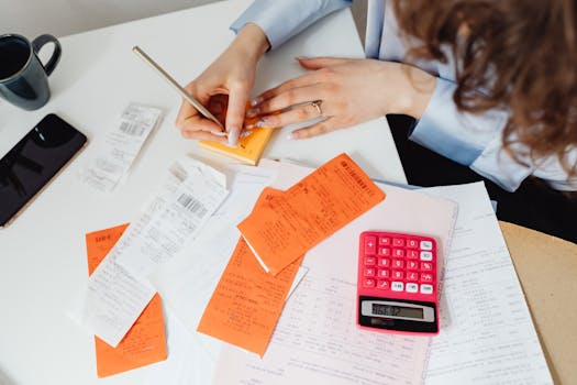 a person calculating expenses