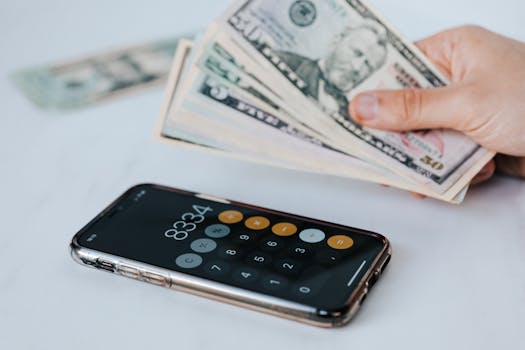 image of a smartphone displaying a savings app